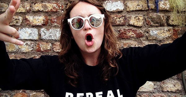 Una Mullally wearing sunglasses and a Repeal The 8th jumper