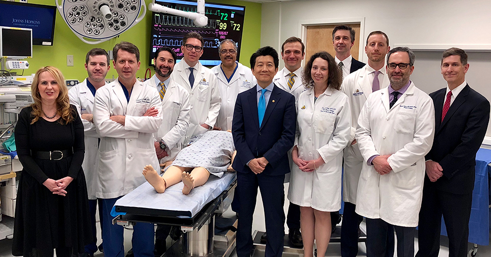 Surgeons of most complex penis and scrotum surgery pose for a photo