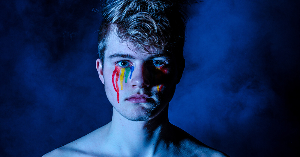 social anxiety image of a man with rainbow tears