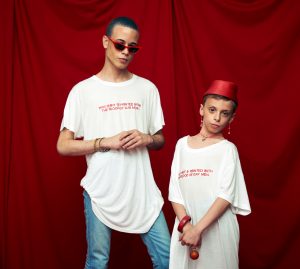 Two Models Wearing Blood Is Blood Donation Ban Shirt