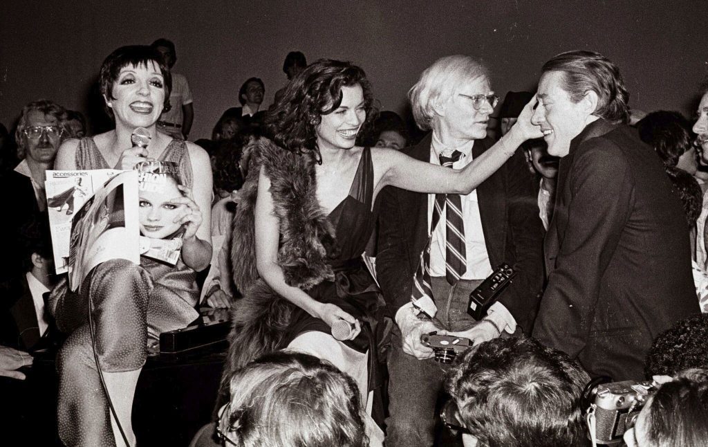 Liza Minelli, Bian c a Jagger, Andy Warhol, and Halston at Studio 54. Photographer: Adam Schull.