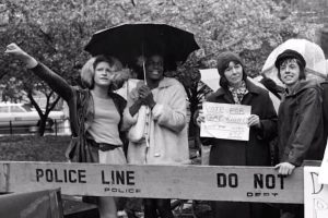 Rivera and Johnson stand at police line, history made