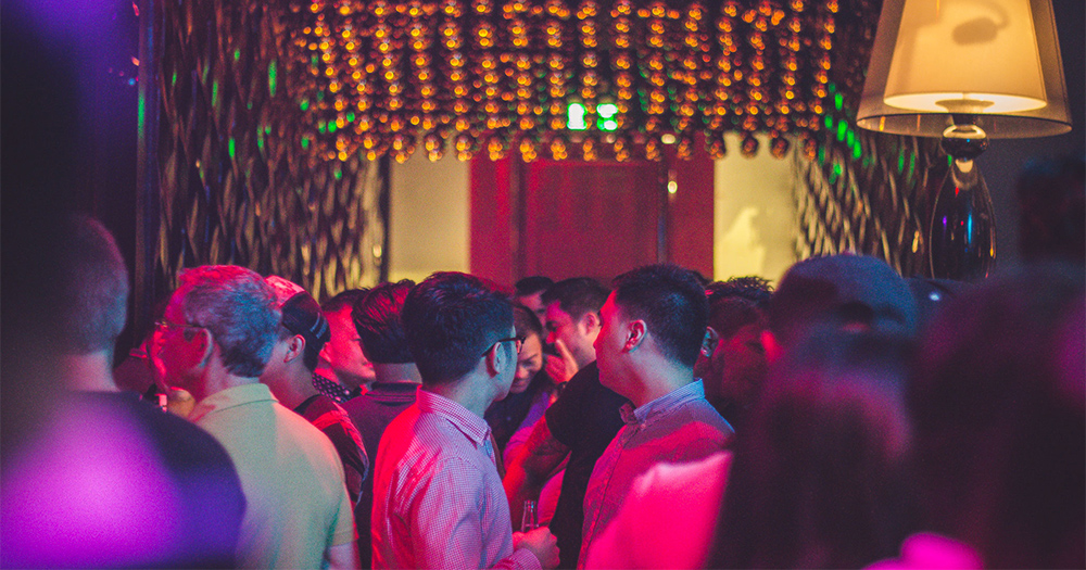 The gay club where the hen party wished to visit filled with men chatting and drinking