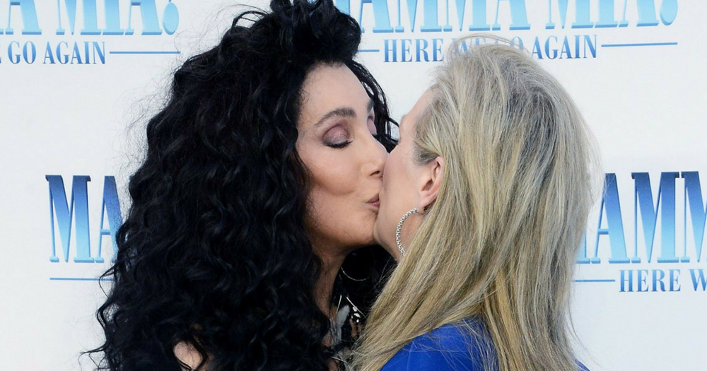 Cher and Meryl Streep share a kiss at the premiere of Mamma Mia 2: Here We Go Again