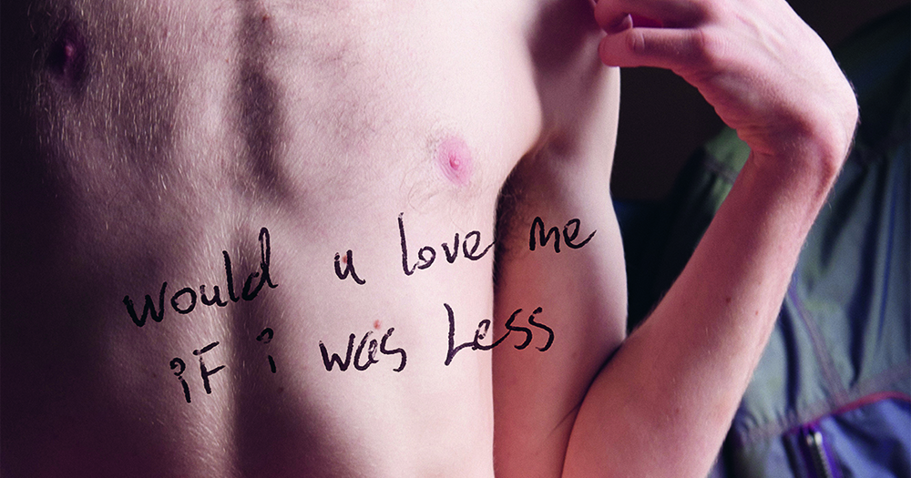 Photo project based on Grindr users - the photo shows a bare chest with the caption "would you love me if I was less"