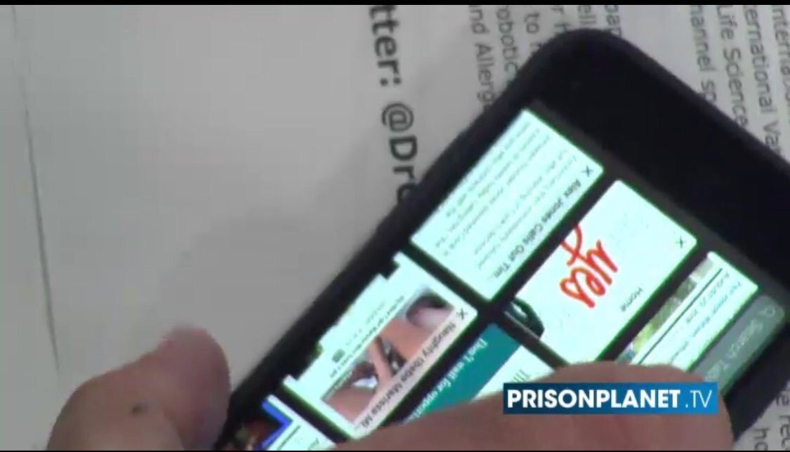 Transphobic Right wing host Alex Jones phone shows transgender-themed porn