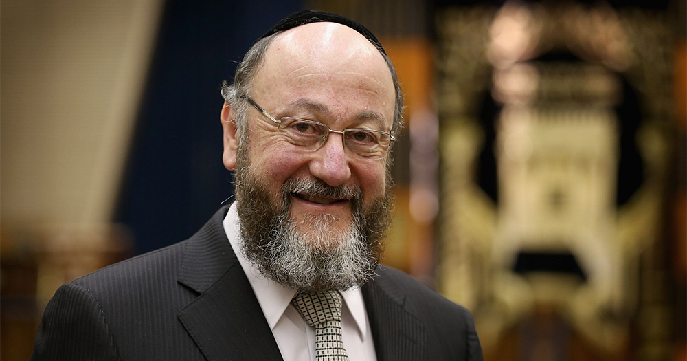 Chief rabbi Ephraim Mirvis smiles at the camera
