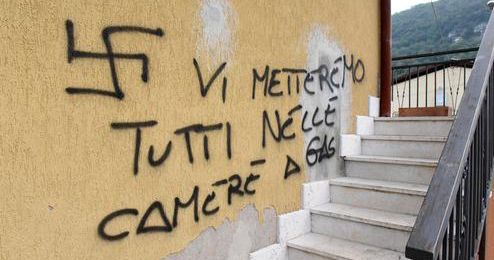 A gay couple's apartment was vandalised a month before the teenager escaped from the home she was imprisoned in.