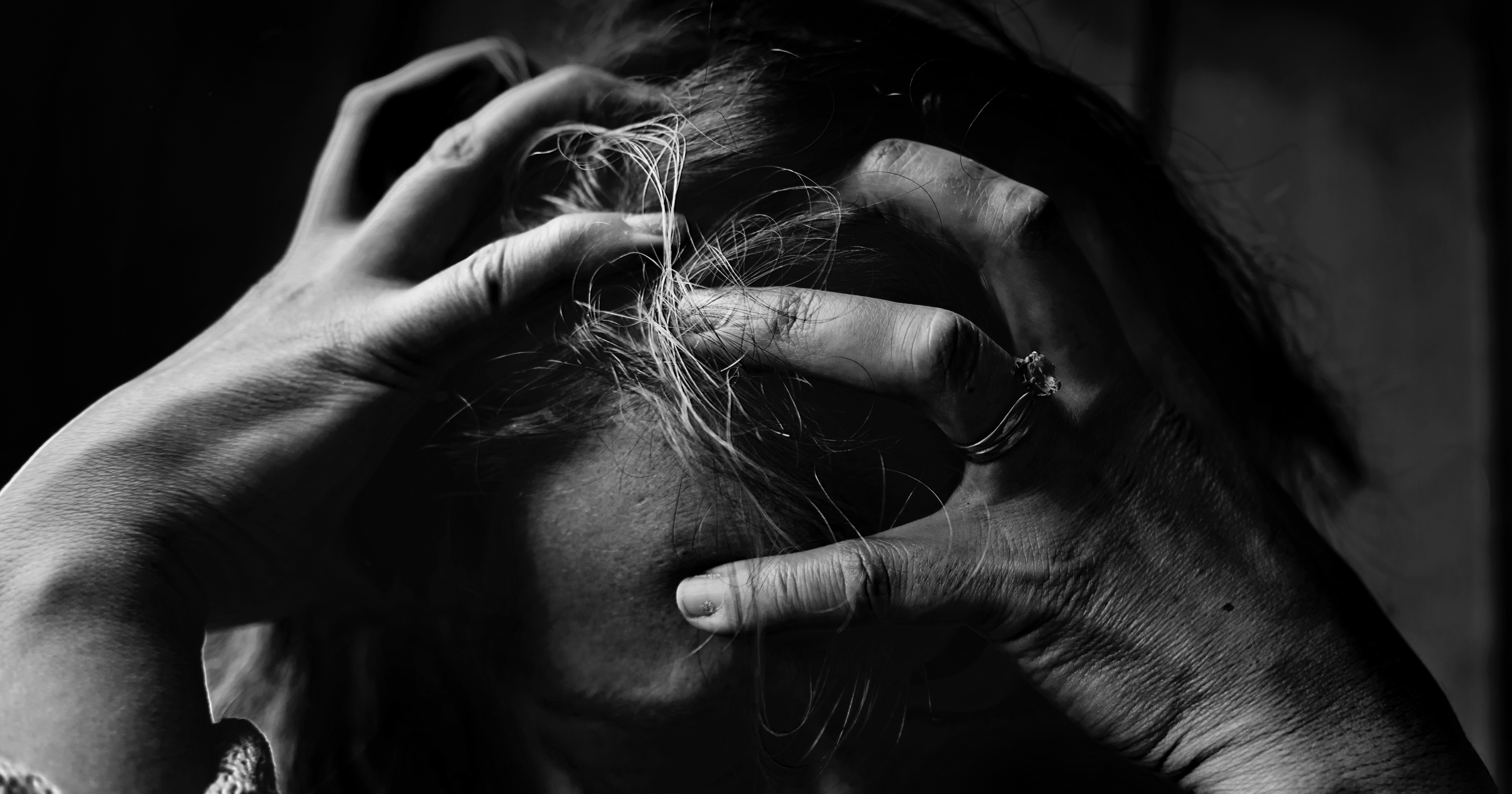 Image of a stressed person. The Australian report detailed the horror of conversion therapy.