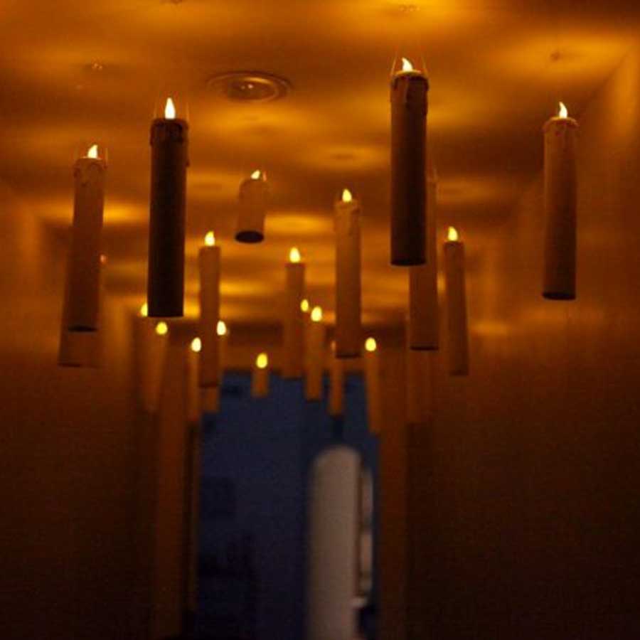 Floating candles used as prop for a Halloween party