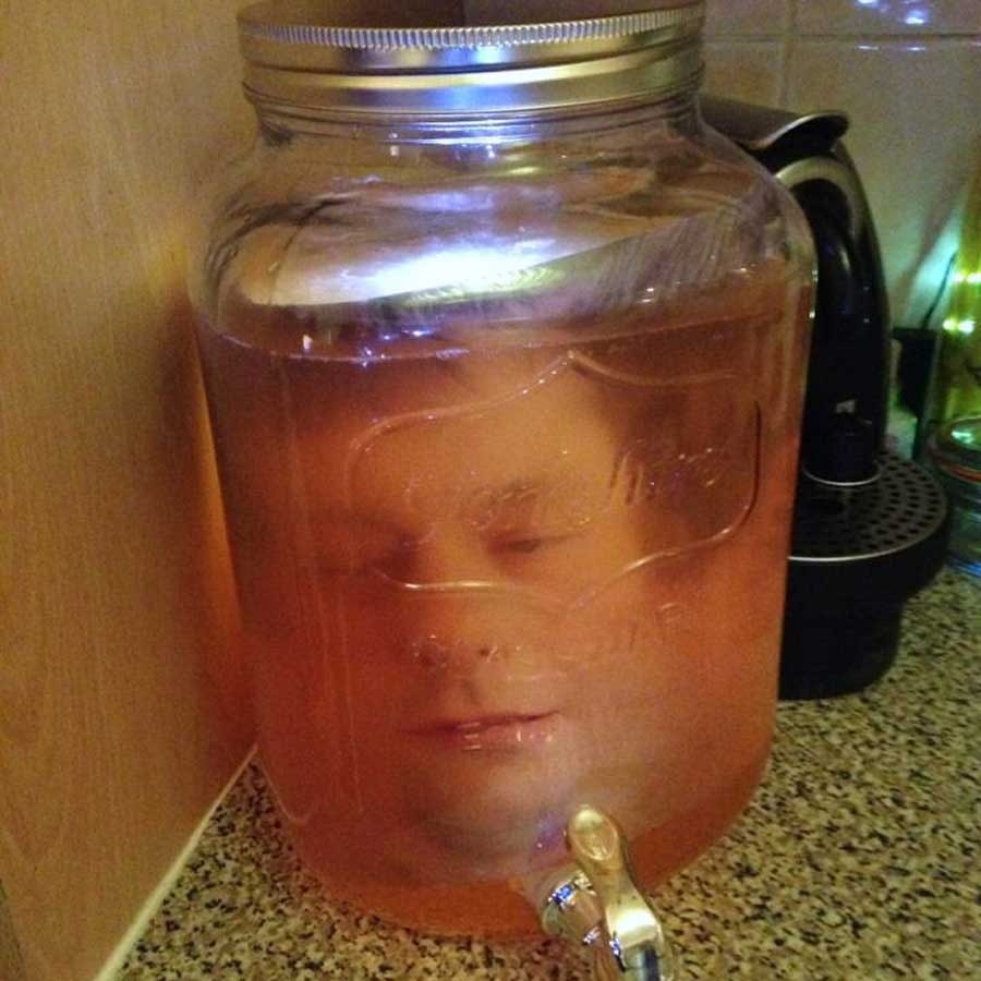 Head in a jar used as prop for a Halloween party
