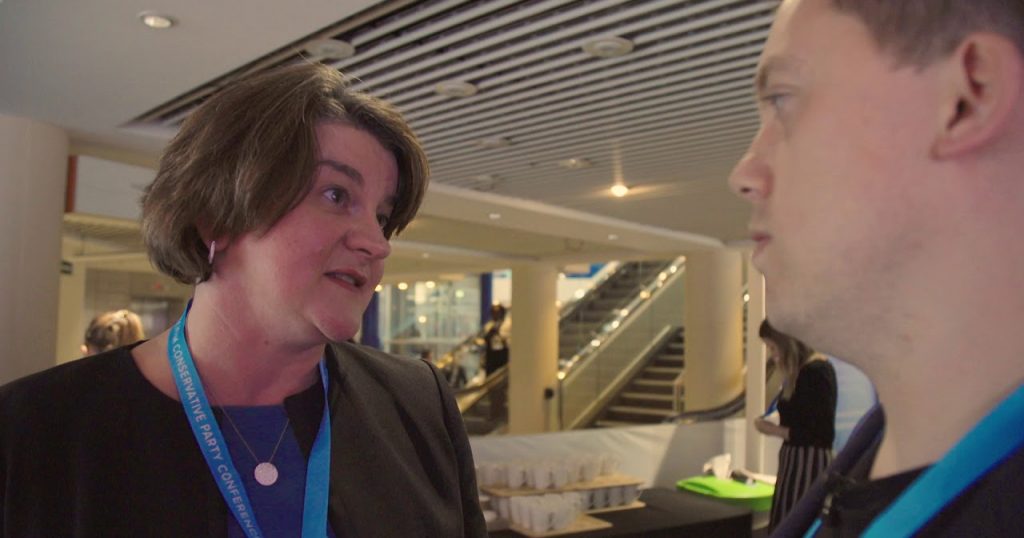 Arlene Foster speaking with reporter Owen Jones