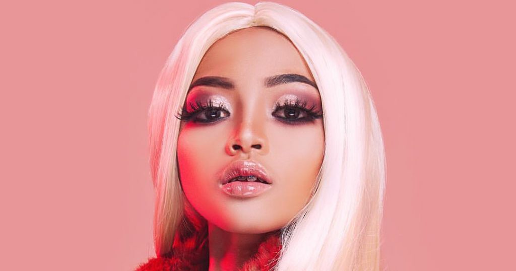 12 year-old drag queen, Nes, poses in close up image in full drag