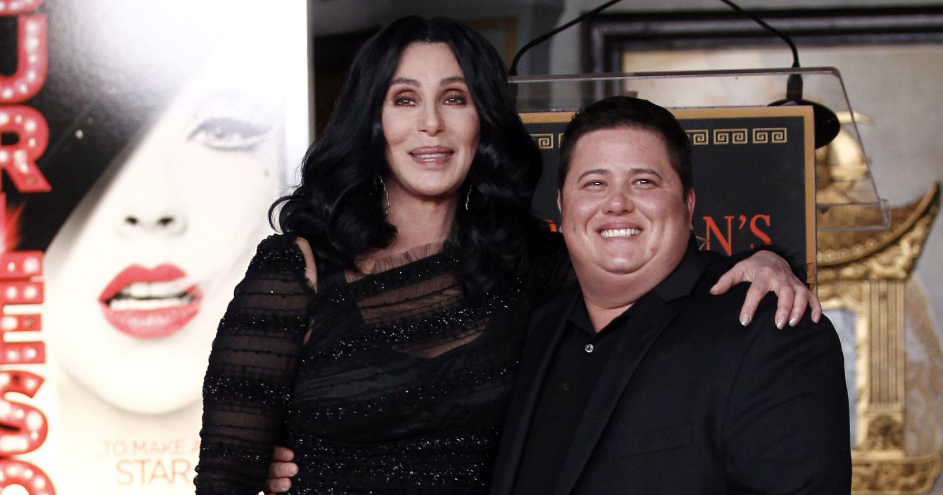 Cher and son Chez smiling at the premiere of Burlesque
