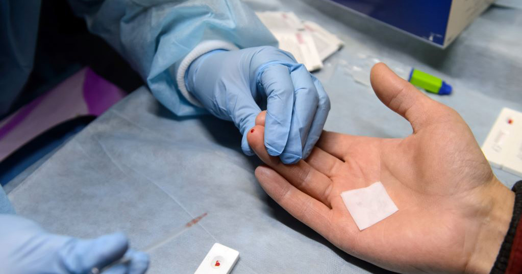 A doctor carrying out a HIV test on a patient as an Israeli company claim to find an HIV cure