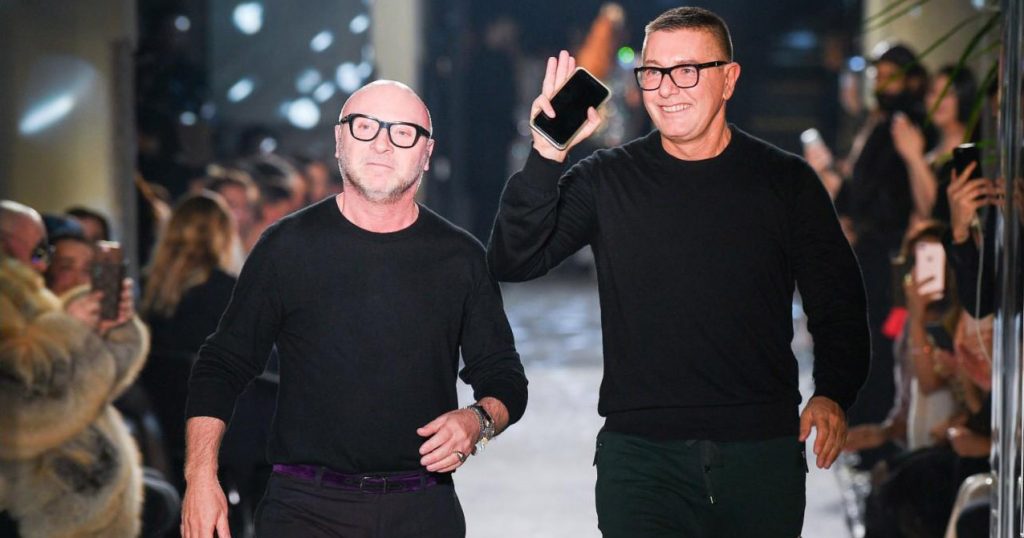 Dolce and Gabbana walking a run way together