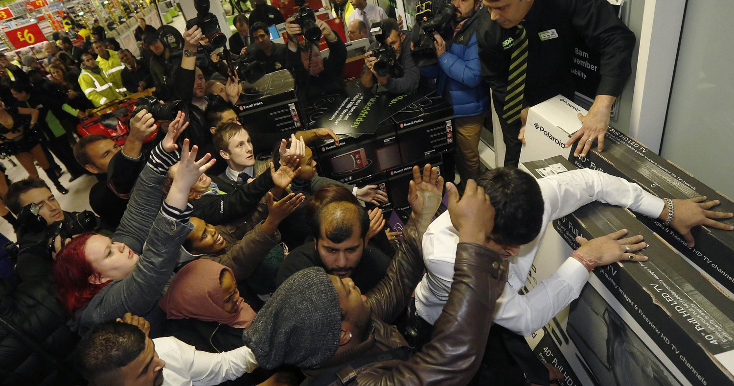 A crush of people fighting over televisions on Black Friday to which a Dublin shop has reacted