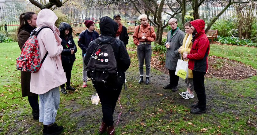 Students at gather at Trinity College to mourn lives lost to transphobic violence. 