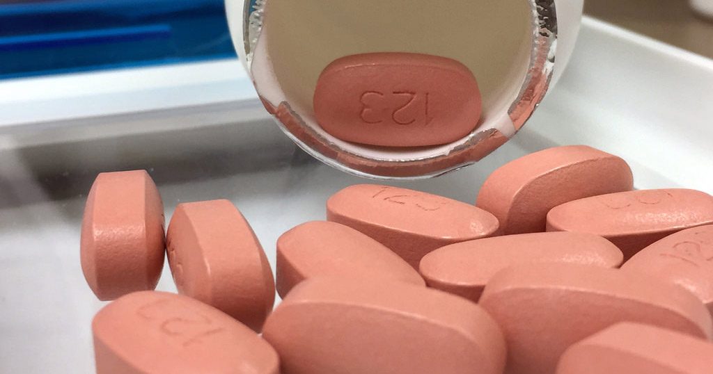 HIV drug spilled out onto a glass table