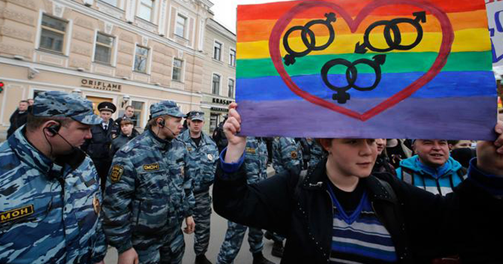 Activists protest Russia's anti-LGBT laws against Russian police