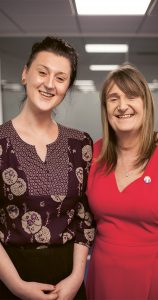 Sara R Phillips and Alexis Riva pose for a portrait