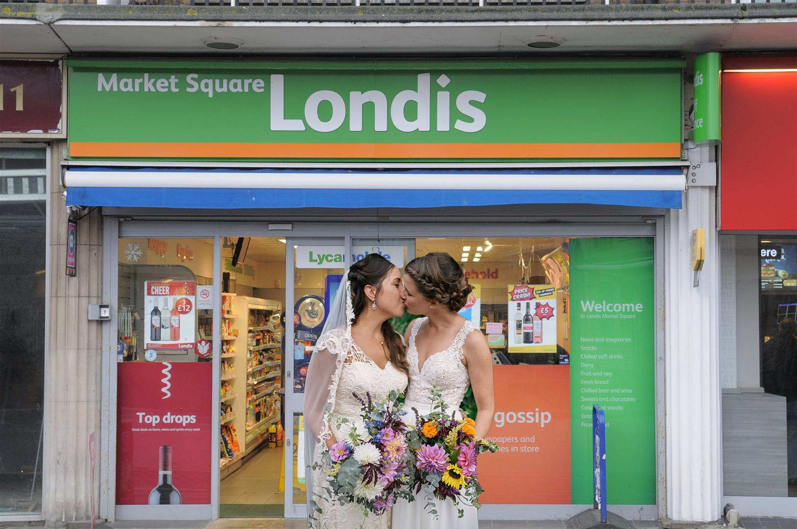 two women getting married outside londis