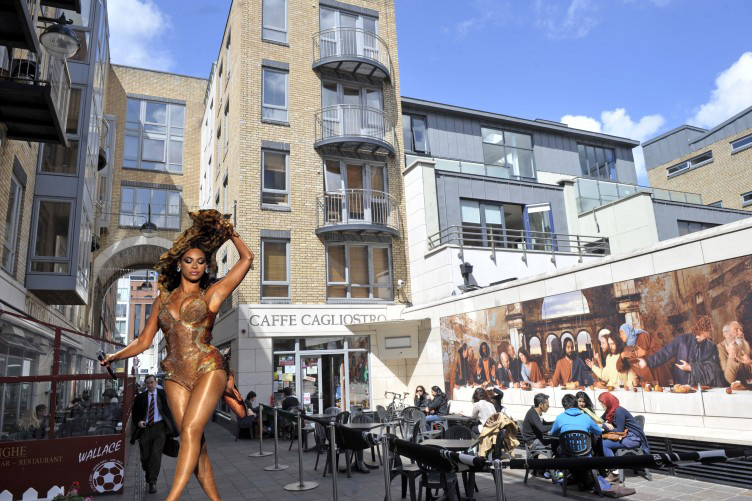Beyonce walking down millenium walkway
