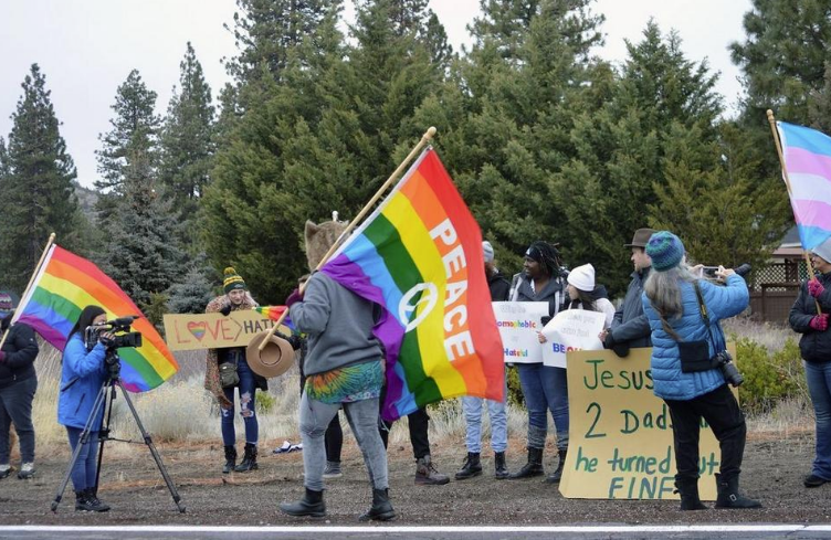 Rally at Presbyterian Church that spread anti-LGBT+ messages with sign outside their building.