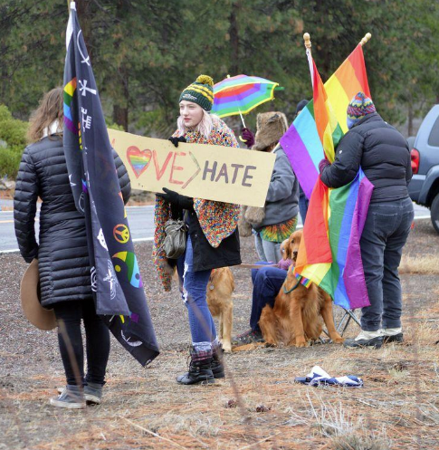Rally at Presbyterian Church that spread anti-LGBT+ messages with sign outside their building.