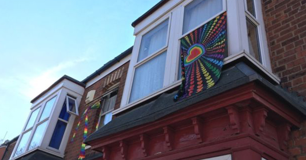 LGBT flags hanging in a neighbourhood