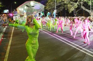 Panto leads the Sydney Queer Irish Mardi Gras team all holding umbrellas