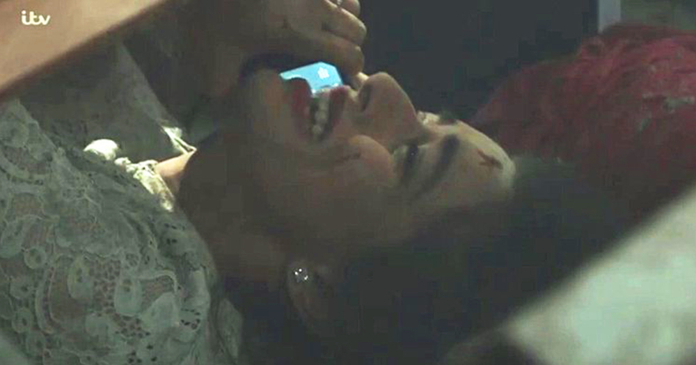 Character of Rana on the phone to Kate while trapped beneath the rubble