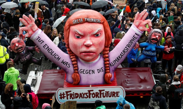 Climate action protest with giant float of Greta Thunberg