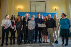 Mayor Trzaskowski and local LGBT+ advocates stand together against Warsaw homophobes