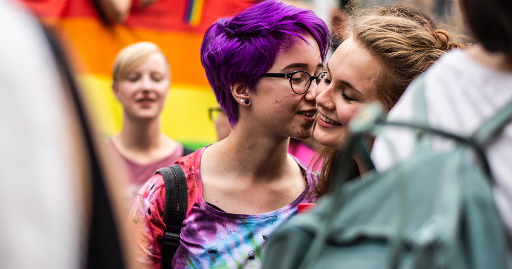 A lesbian couple celebrating lesbian visibility