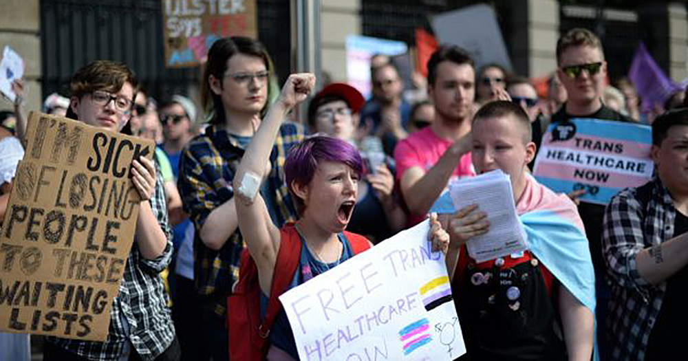 Members of the This Is Me trans health campaign at a protest