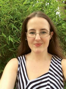 Cassia Gaden Gilmartin smiling. In this piece Cassia talks about arts activism