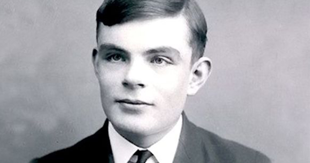 Black and white photo of Alan Turing