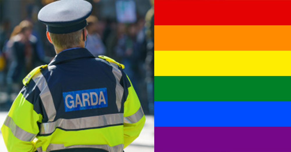 garda adjacent to rainbow flag