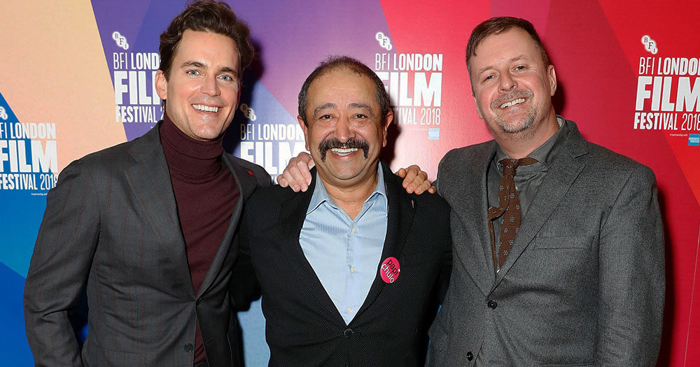 John Butler with his two male actors on the red carpet of the premiere
