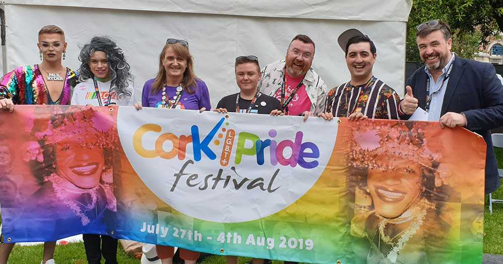 representatives of cork pride hold banner