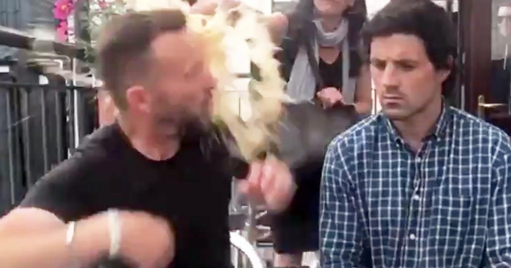 Milkshake being thrown on Rowan Croft