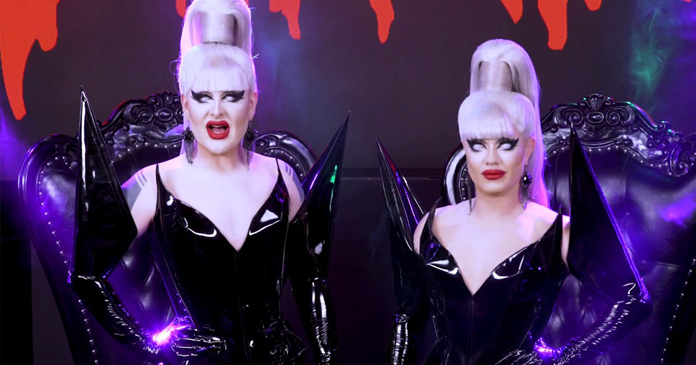 Boulet Brothers standing in front of the judges chairs during the Boulet Brothers' Dragula Season 3 trailer