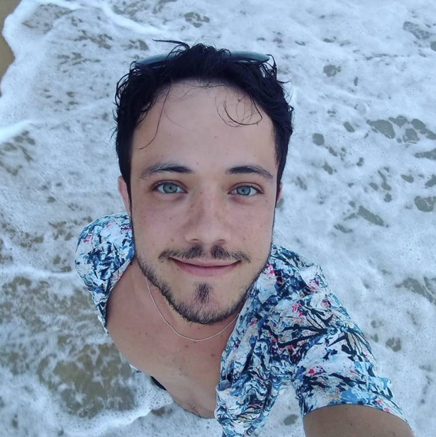 Danilo Matta seen smiling on the beach