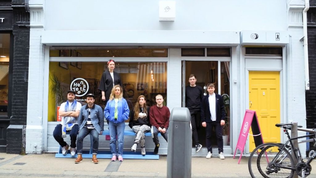 Hen's Teeth team stand outside their previous home on Fade Street