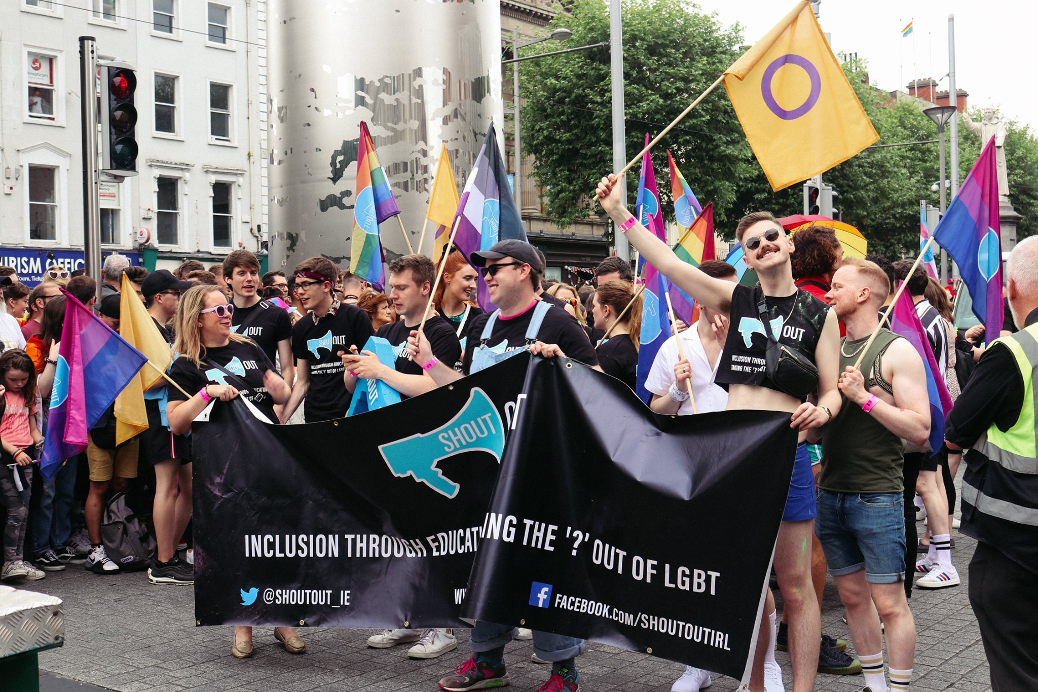 ShoutOut volunteers march behind banner in Dublin Pride parade 2019