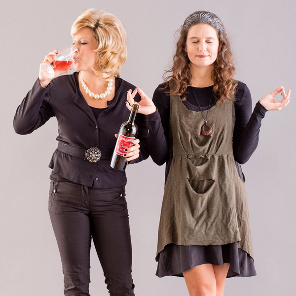Two women dressed up in Grace and Frankie Halloween costumes