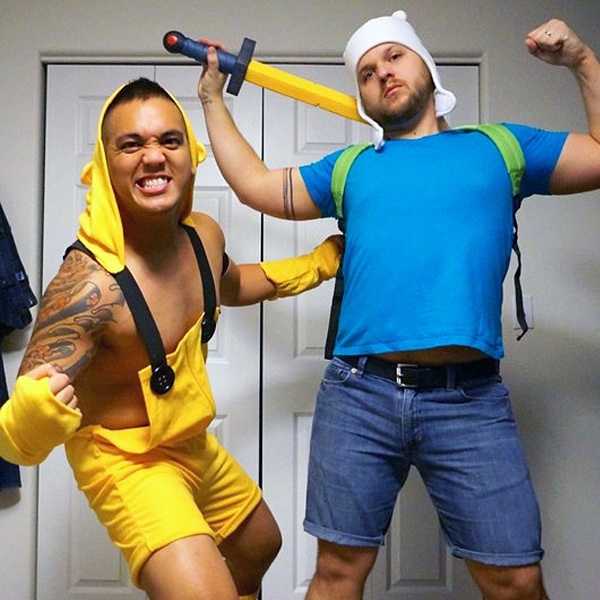 Two men dressed up in Jake and Finn Halloween costumes
