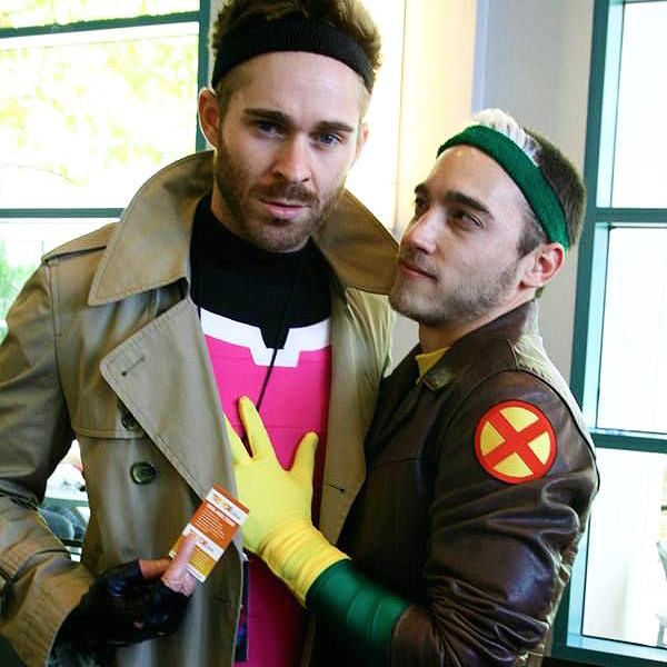 Two men dressed up in Gambit and Rogue Halloween costumes