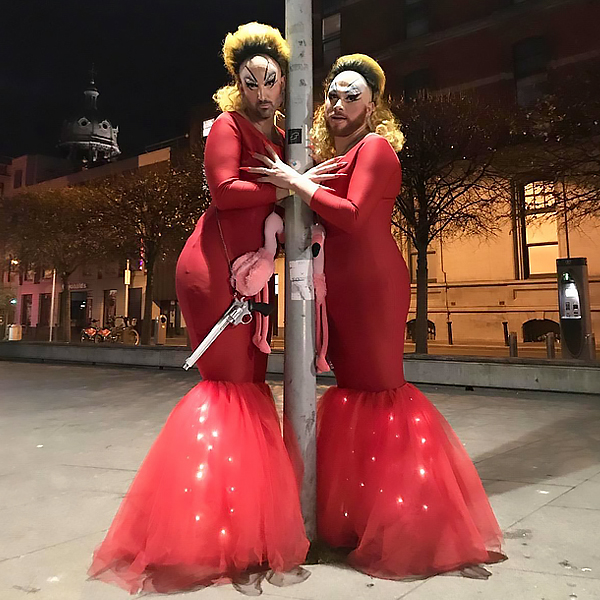 Two men dressed up as Devine
